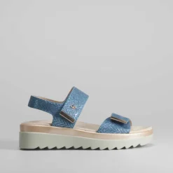 Sandalia cuña azul brillos COMFEET